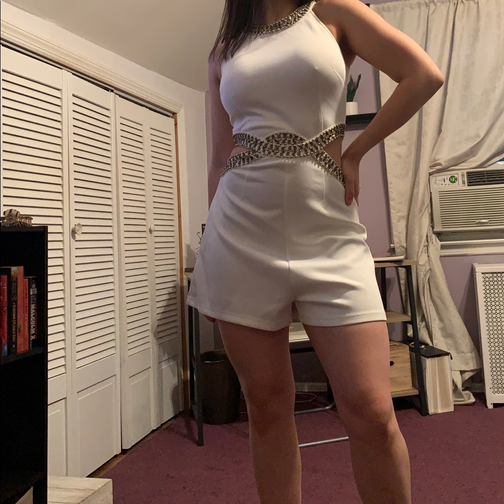 White embellished romper.
